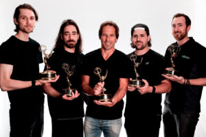 Photo of Maverick Boston Video Production Team Holding Emmy Awards
